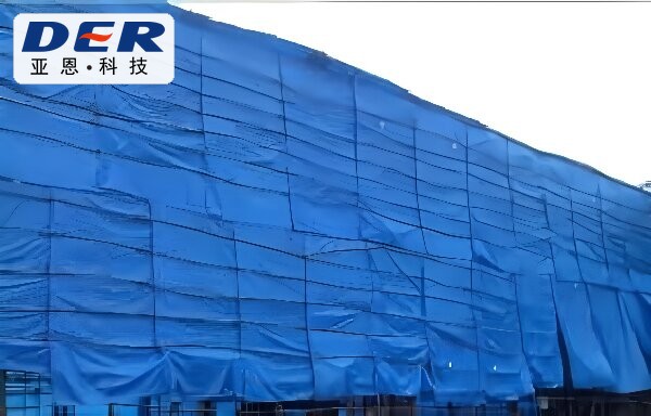 Blue building site PVC tarp covering scaffolding
