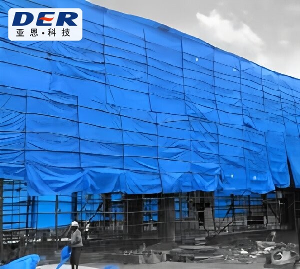 Reinforced blue PVC construction tarpaulin installation